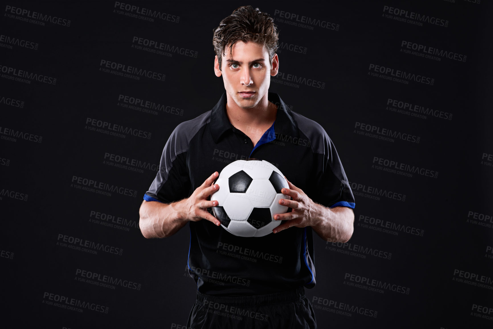 Buy stock photo Portrait, soccer ball and man in sports for fitness, training or practice as athlete or player in football. Male person, passion and game for exercise, wellness and goal on black background in studio