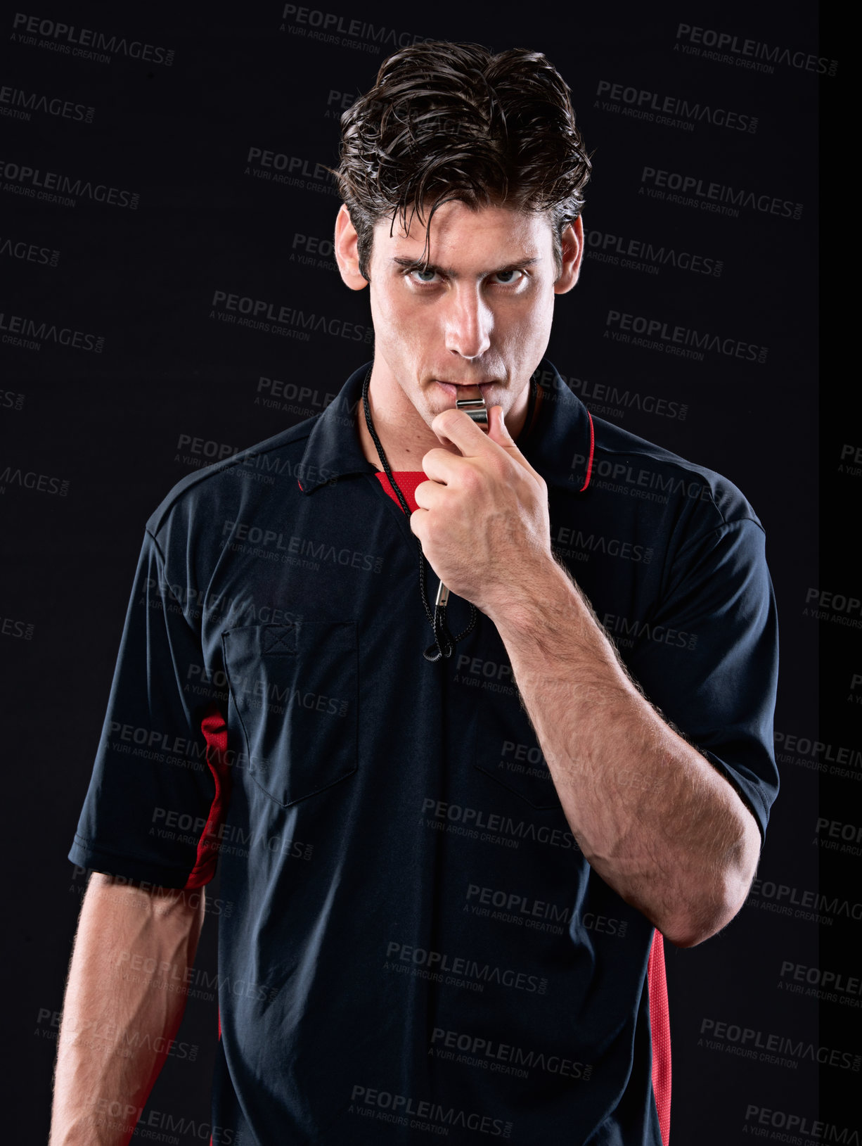 Buy stock photo Shot of a referee blowing his whistle