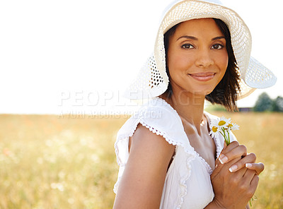 Buy stock photo Portrait, flowers space or happy woman in field, countryside or nature in summer to relax on mockup. Hat, grass or lady in outdoor garden or farm for fresh air on holiday vacation travel or freedom