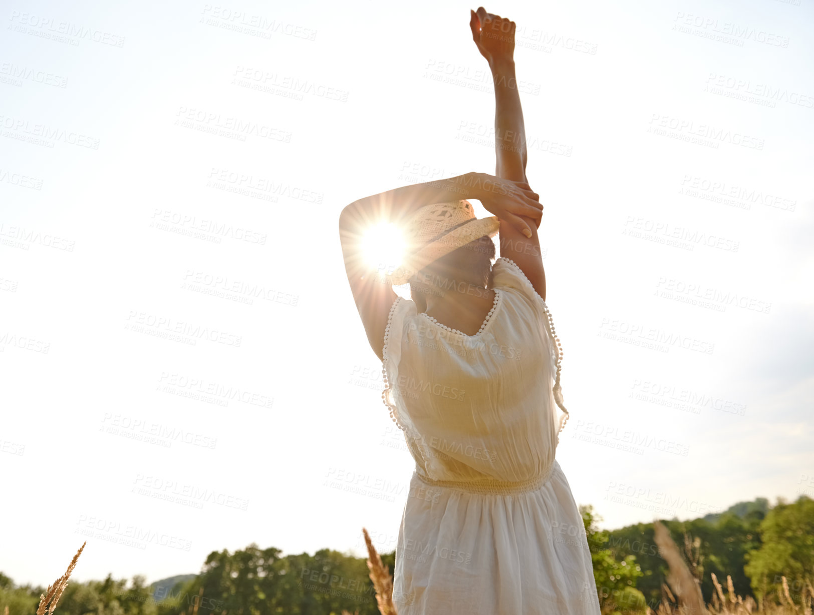 Buy stock photo Back, stretching and woman with freedom, sunshine and outdoor with celebration and carefree. Rear view, nature and girl with environment and countryside with vacation and holiday with getaway trip