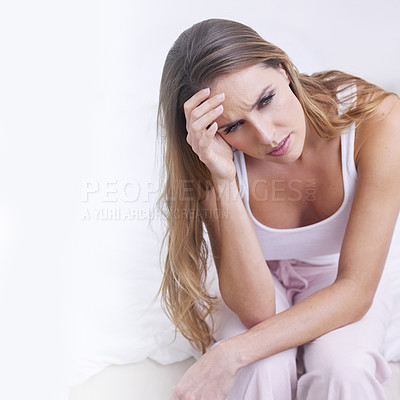 Buy stock photo Frustrated woman, headache and stress on bed in morning, wake up or mistake in depression at home. Upset young female person with migraine, anxiety or mental health sitting in bedroom on mockup space