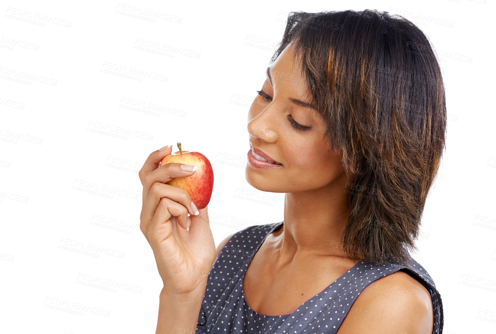 Buy stock photo Health, fruit or black woman eating an apple in studio on white background with marketing mockup space. Smile, organic or happy African girl advertising healthy food or diet for self care or wellness