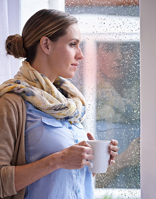 Buy stock photo Woman at window, thinking with tea and reflection, life and future in morning routine, raindrop and wellness. Insight, memory and mindfulness with warm beverage, coffee break and relax at home