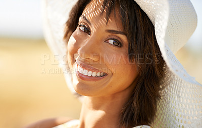 Buy stock photo Portrait, happy woman in hat at field or countryside in summer outdoor, beauty or health. Face, smile and young person at farm, nature and garden to travel on holiday, vacation or tourism in Brazil