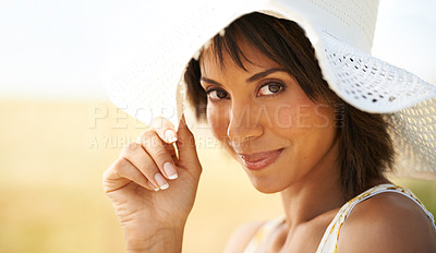 Buy stock photo Portrait, smile and woman in hat at countryside or field in summer outdoor, beauty or health. Face, happy or young person at farm, nature or garden to travel on holiday, vacation or tourism in Brazil