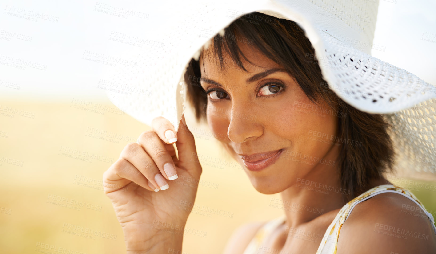 Buy stock photo Portrait, smile and woman in hat at countryside or field in summer outdoor, beauty or health. Face, happy or young person at farm, nature or garden to travel on holiday, vacation or tourism in Brazil