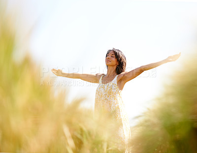 Buy stock photo Peace, freedom and woman with arms raised at field outdoor in the countryside in spring. Person in nature, eyes closed and meditation to relax at farm, breathe fresh air and enjoy vacation on mockup