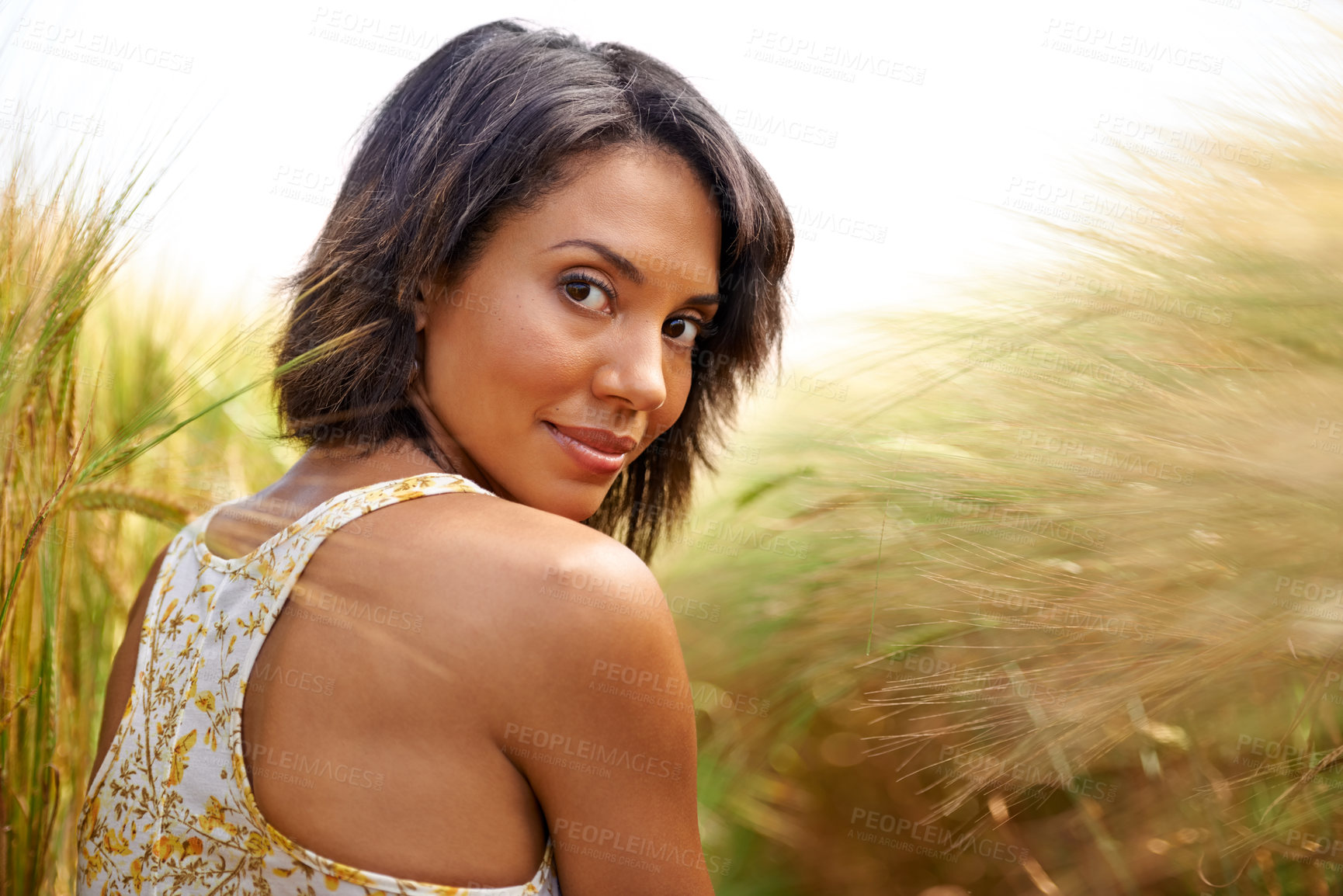 Buy stock photo Portrait, confidence and woman in wheat field in countryside, outdoor summer for health and beauty. Face, back of person at farm grass and nature, garden and travel on holiday or vacation in Brazil