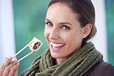Buy stock photo Woman, eating sushi and healthy food in portrait, lunch or dinner, Japanese cuisine and seafood with chopsticks. Catering, hungry and diet, relax with meal at home and happy with dish for nutrition