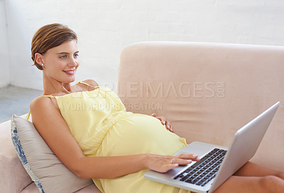 Buy stock photo Happy, pregnant or woman on laptop in house living room for childcare website, information or birth wellness learning. Smile, relax or person on home sofa with technology, research and pregnancy blog