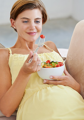 Buy stock photo Pregnant woman, salad and smile on sofa for health, nutrition and wellness in living room of apartment. Person, vegetables or happy on couch of lounge for relax, pregnancy and healthy diet with fiber
