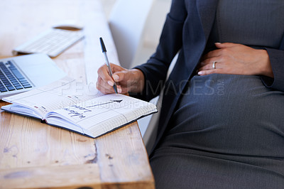 Buy stock photo Businesswoman, pregnant and date for maternity closeup 
for work break, waiting for motherhood. Female person, stomach and notebook as professional employee for career relax, appointment for care
