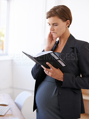 Buy stock photo Business woman, pregnant and thinking with diary for schedule, planner or agenda at office. Female person or employee in wonder, maternity or pregnancy with notebook for calendar, plan or reminder