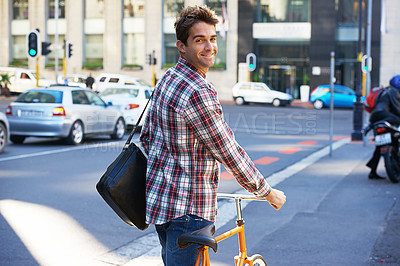 Buy stock photo Portrait, happy man and travel on bicycle in city on eco friendly transport outdoor, commute and walking. Cycling, person and bike in urban town, road and street for journey on sidewalk in Canada