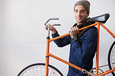 Buy stock photo Man, studio and bike for eco friendly, portrait and transportation on white background. Hipster cyclist, carbon neutral and sustainability travel for environmental commute or fitness and trip