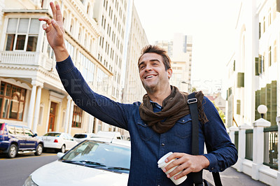 Buy stock photo Hailing, city and travel with man, commute and happy with  traffic or transportation with journey or road. Person, outdoor or Italy with guy or explore with morning coffee or street with wave or sign