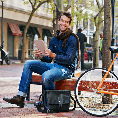 Buy stock photo Portrait, outdoor and smile with man, tablet and bicycle with connection and relax with internet and social media. Person, funny and New York with guy and technology with digital app or communication
