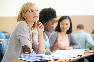 Buy stock photo Student, woman and thinking in university classroom, information and notes for studying. People, planning and knowledge in education for learning, problem solving and ideas for solution in assessment