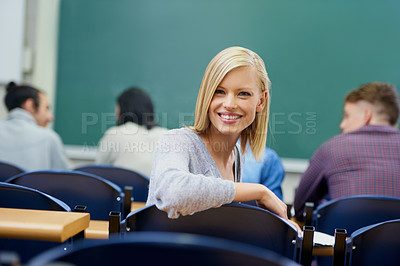 Buy stock photo University student, portrait and education at classroom desk in London for english lecture, knowledge or scholarship. Female person, face and academy for certificate or diploma, teaching or lesson