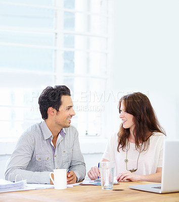 Buy stock photo Planning, meeting and business woman with partner talking, collaboration and onboarding, teamwork and b2b communication. Happy people with paperwork, documents and laptop in office for discussion
