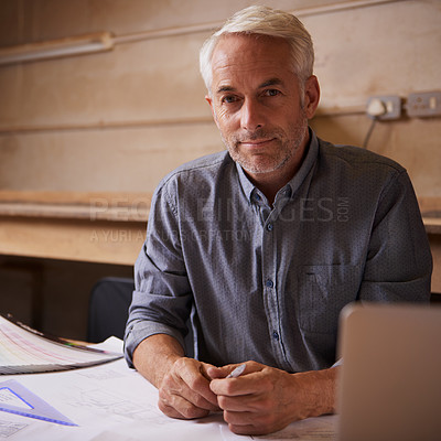 Buy stock photo Portrait, laptop and senior architect in workshop, smile and career in construction industry. Man, contractor and entrepreneur of startup, small business and paperwork with design for planning