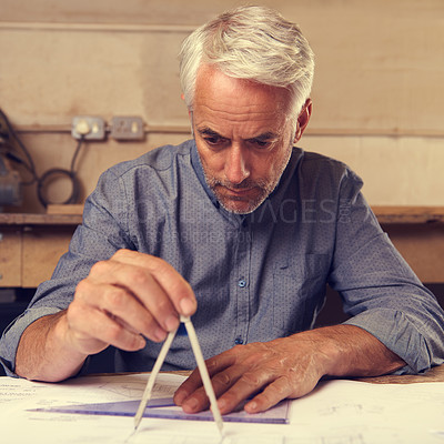 Buy stock photo Senior man, compass and architect drawing blueprint, construction and civil engineering with stationery. Design tools, equipment and closeup of hands with floor plan for property or renovation job