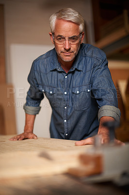 Buy stock photo Carpenter, thinking and planning in workshop, design and contractor in small business. Furniture, woodwork and production table with clamp for lumber or timber, safety glasses and materials or tools
