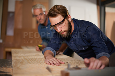 Buy stock photo Solution, father and son in a workshop, wood and safety glasses with gear and teamwork with choice. Architect, men and tools with construction and building with planning for project and renovation