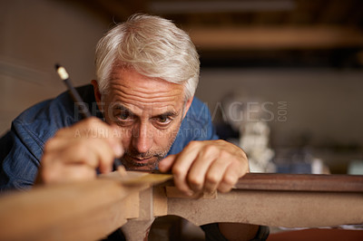 Buy stock photo Focus, furniture manufacturing and carpenter with pencil, table and antique restoration workshop. Creativity, small business and professional carpentry measurement for sustainable wood project design