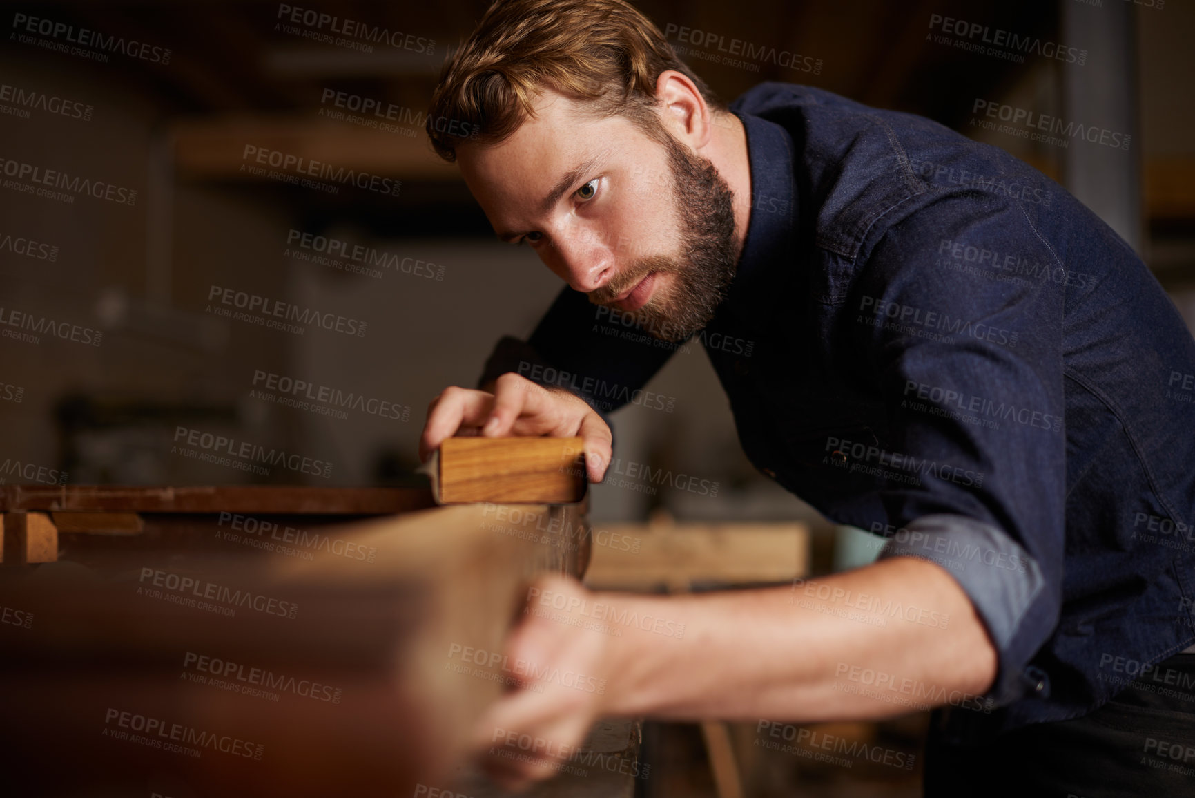Buy stock photo Contractor, wood sanding and man in workshop working on building construction and architecture. Home improvement, maintenance and handyman work of a male employee with carpentry tool for woodwork