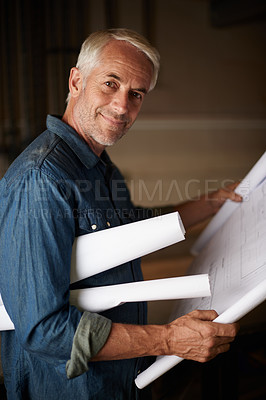 Buy stock photo Senior architect, blueprint and man with drawing, renovation or remodeling project and floor plan design. Architecture industry, engineer and male professional designer in portrait with mission