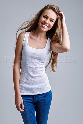 Buy stock photo Studio portrait of a casually dressed young woman