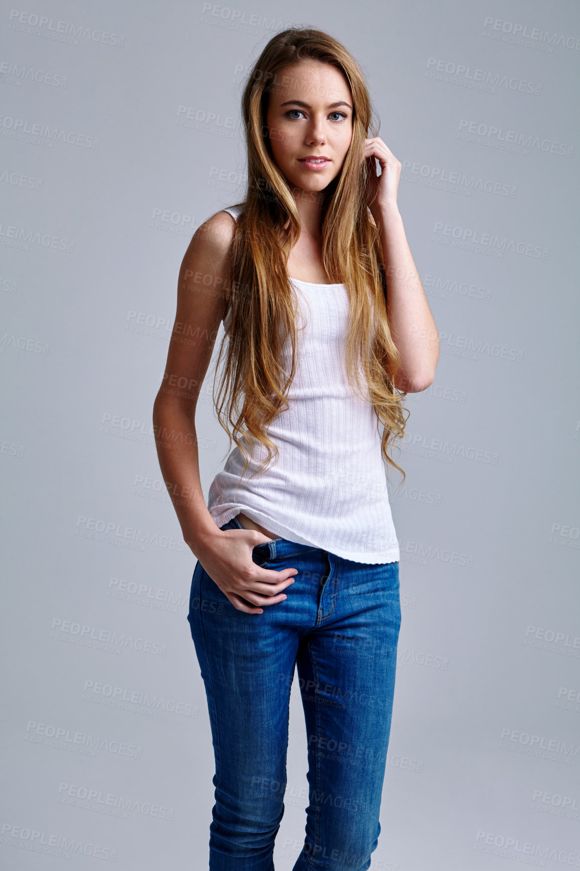 Buy stock photo Studio portrait of a casually dressed young woman