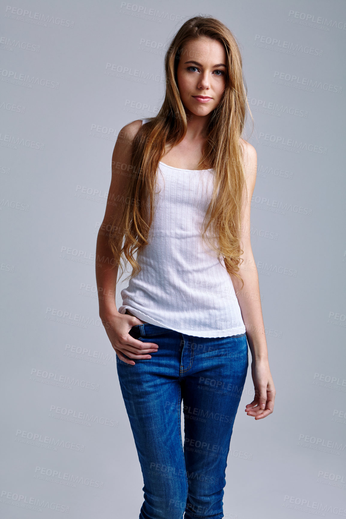 Buy stock photo Studio portrait of a casually dressed young woman