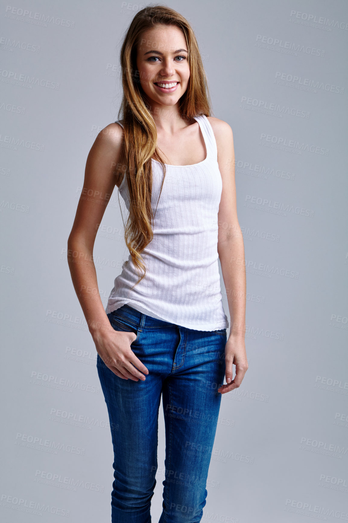 Buy stock photo Studio portrait of a casually dressed young woman