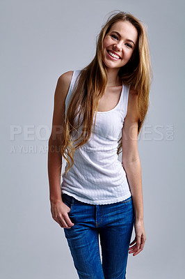 Buy stock photo Studio portrait of a casually dressed young woman