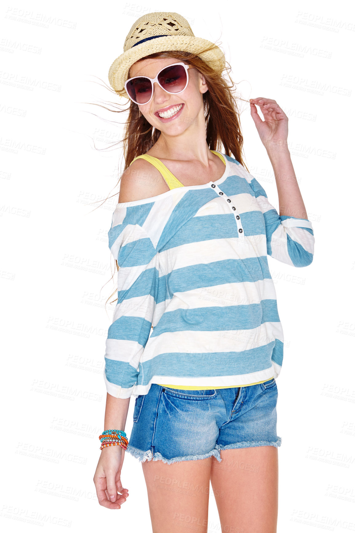 Buy stock photo Studio shot of a young woman dressed for summer isolated on white