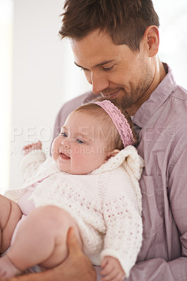 Buy stock photo Family, baby and dad in home with love, support and youth with parent and bonding. Relax, father and happy in a house with hug of calm infant with childcare and smile with a girl in living room