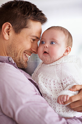 Buy stock photo Father, hug and baby with love, support and care for family, bonding and paternity at home. Happy dad, parent or man playing with his newborn child for affection, development and excited for growth