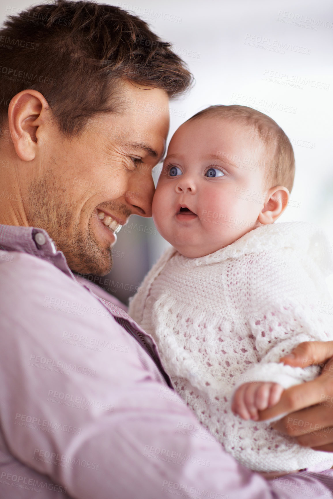 Buy stock photo Father, hug and baby with love, support and care for family, bonding and paternity at home. Happy dad, parent or man playing with his newborn child for affection, development and excited for growth