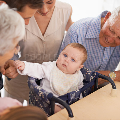 Buy stock photo Parents, grandparents and baby with portrait in home with bonding, security and healthy development. Family, men and women or infant in high chair with serious face, vulnerable and parenting in house