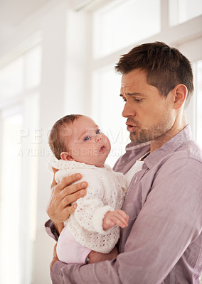 Buy stock photo Father, care and newborn baby with love, support and console for family on paternity. Dad, single parent or man helping his child or infant with development, growth and bonding or nurture at home