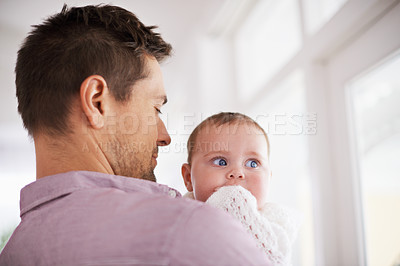 Buy stock photo Father, baby and home with love, parent and bonding together with newborn and kid. Caring, family and dad with young child in a living room with support and care in a house carrying a calm infant