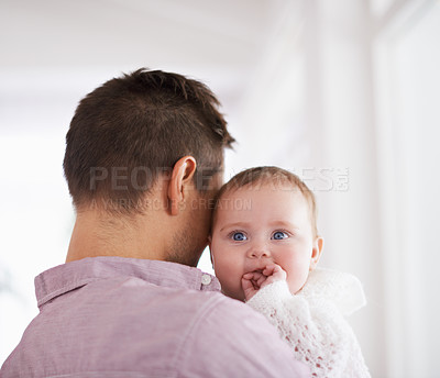 Buy stock photo Father, baby and home with love, morning and bonding together with newborn and smile. Happy, family and dad with young child in a living room with parent care in a house carrying a calm infant