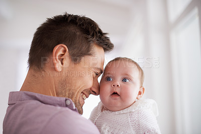 Buy stock photo Love, father and baby with smile in home for bonding, comfort or playing together for healthy development. Family, man and newborn child with embrace, happy and relax for parenting, care and security