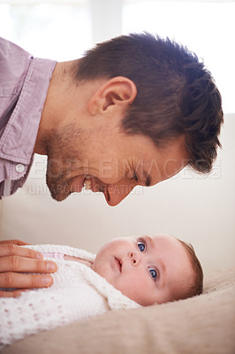 Buy stock photo Father, playing and newborn baby on bed with love, support and care for family, paternity and bonding. Excited dad, man or parent with his child or kid for development, growth and nurture at home
