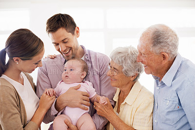 Buy stock photo Parents, grandparents and baby with happiness in home for healthy development, security and comfort in apartment. Family, men and women with infant, smile and embrace for parenting, bonding and love