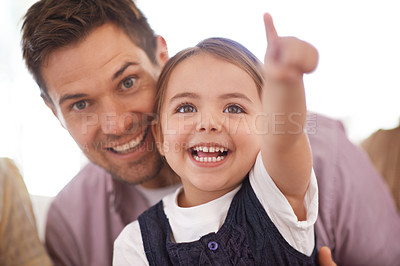 Buy stock photo Happy, father and daughter excited at family home, smile and cheerful on sofa. Bonding time, dad and child with face expression young girl, motor skills growth and development in house