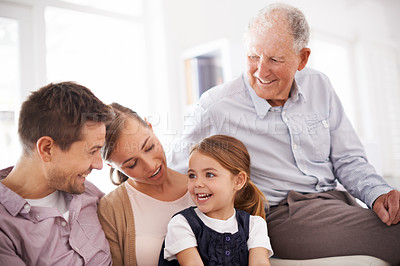 Buy stock photo Parents, grandfather and child with happiness on sofa for healthy development, security or comfort in apartment. Family, men and woman with girl kid, smile and bonding for parenting and love in house