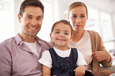 Buy stock photo Portrait, family and happy kid with parents in home for bonding, love and relax together. Face, mother and father with girl in living room for relationship and care of child for connection in house